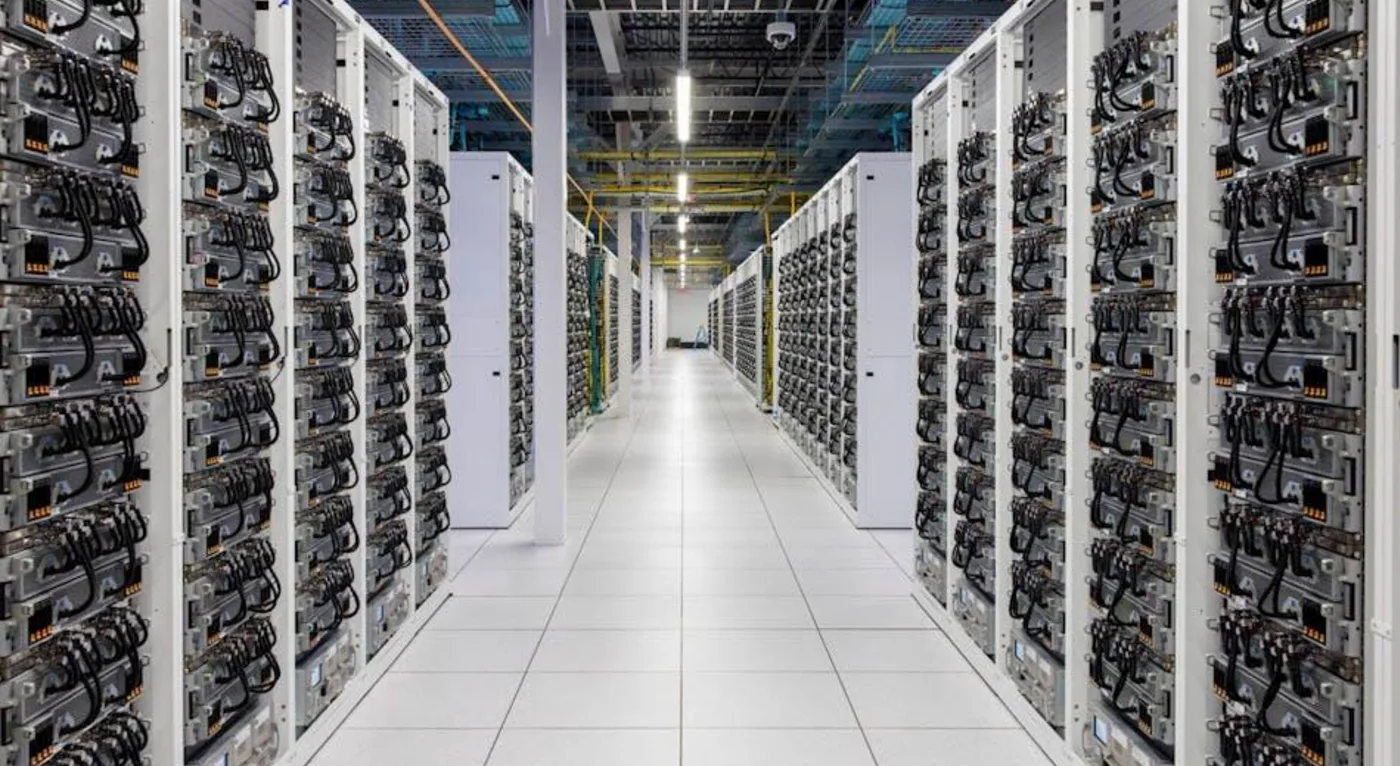 Figure 7.2 Interior of the xAI data center Colossus in Memphis, Tennessee. Colossus contains about 100,000 Nvidia Graphics Processing Units (GPUs) to train language models. Expansion to 200,000 GPUs is already being planned (image source: https://www.datacenterfrontier.com/machine-learning/article/55244139/the-colossus-ai-supercomputer-elon-musks-drive-toward-data-center-ai-technology-domination).
